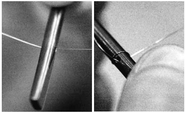 Close up images of a Harpsichord string being threaded into a hitchpin